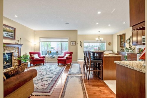 1503 Montgomery Place Se, High River, AB - Indoor Photo Showing Living Room With Fireplace