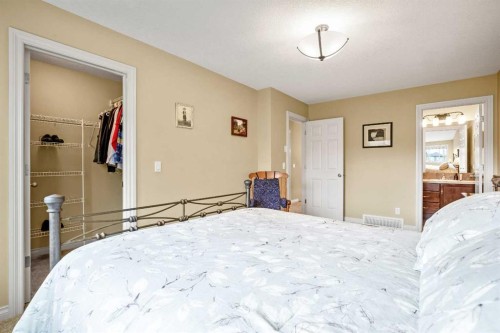 1503 Montgomery Place Se, High River, AB - Indoor Photo Showing Bedroom