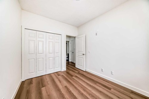 101-22 Panatella Road Nw, Calgary, AB - Indoor Photo Showing Other Room