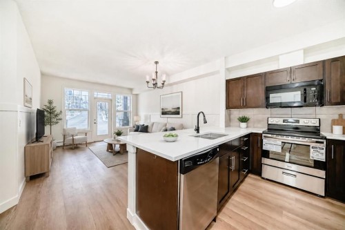 101-22 Panatella Road Nw, Calgary, AB - Indoor Photo Showing Kitchen