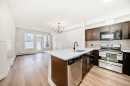 101-22 Panatella Road Nw, Calgary, AB  - Indoor Photo Showing Kitchen 