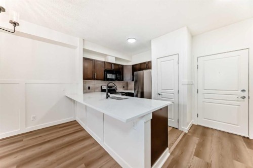 101-22 Panatella Road Nw, Calgary, AB - Indoor Photo Showing Kitchen