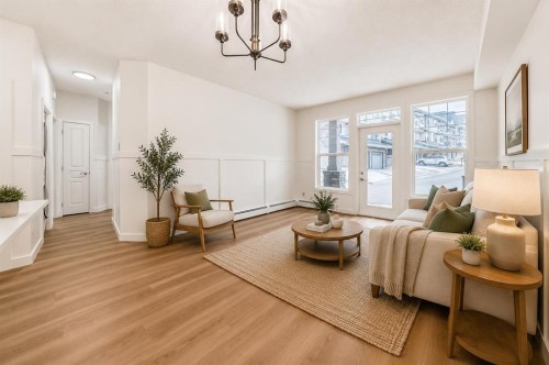 101-22 Panatella Road Nw, Calgary, AB - Indoor Photo Showing Living Room
