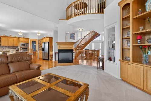 307 Hampstead Way Nw, Calgary, AB - Indoor Photo Showing Living Room With Fireplace