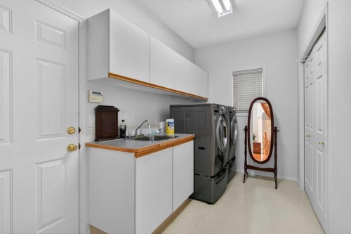 307 Hampstead Way Nw, Calgary, AB - Indoor Photo Showing Laundry Room