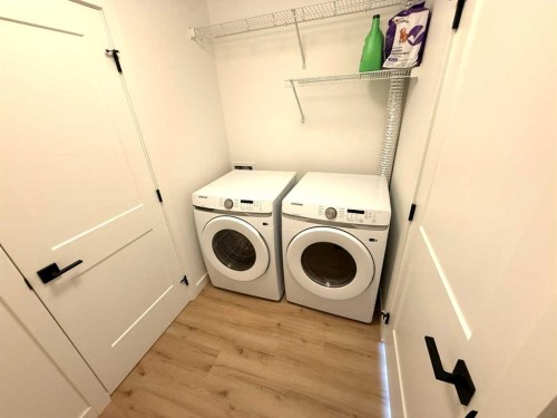 106-70 Sage Hill Walk Nw, Calgary, AB - Indoor Photo Showing Laundry Room