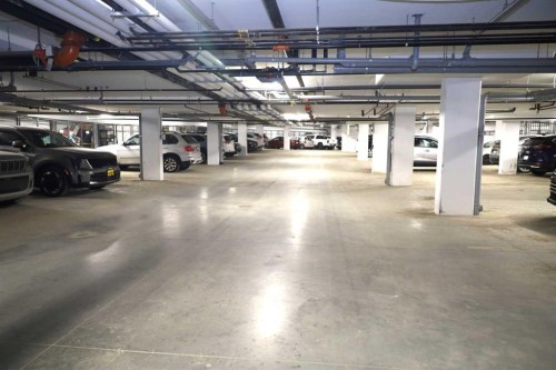 106-70 Sage Hill Walk Nw, Calgary, AB - Indoor Photo Showing Garage