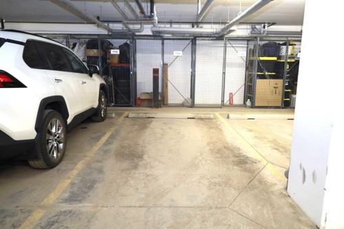 106-70 Sage Hill Walk Nw, Calgary, AB - Indoor Photo Showing Garage