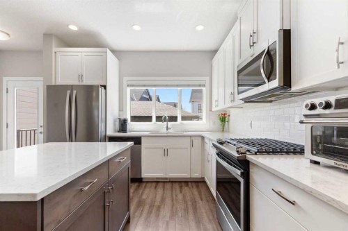 1334 Walden Drive Se, Calgary, AB - Indoor Photo Showing Kitchen With Upgraded Kitchen