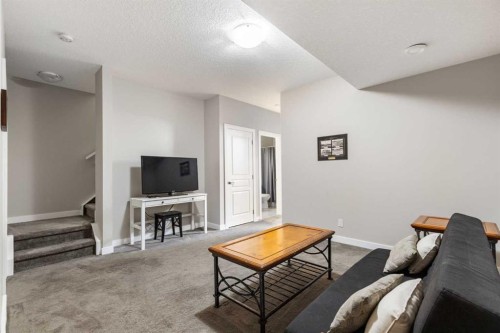 1334 Walden Drive Se, Calgary, AB - Indoor Photo Showing Living Room