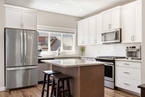1334 Walden Drive Se, Calgary, AB - Indoor Photo Showing Kitchen With Upgraded Kitchen