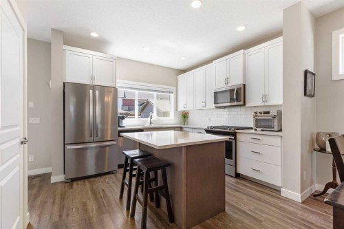 1334 Walden Drive Se, Calgary, AB - Indoor Photo Showing Kitchen With Upgraded Kitchen