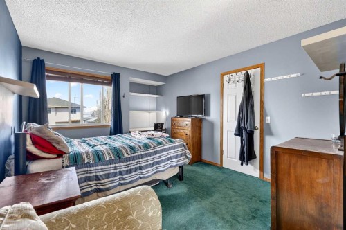 100 Tuscany Way Nw, Calgary, AB - Indoor Photo Showing Bedroom