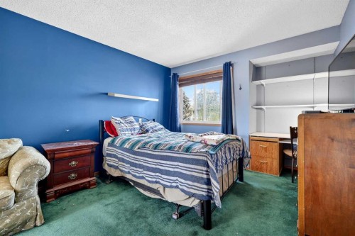 100 Tuscany Way Nw, Calgary, AB - Indoor Photo Showing Bedroom