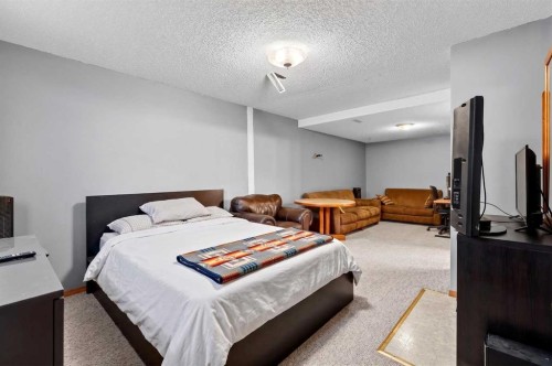 100 Tuscany Way Nw, Calgary, AB - Indoor Photo Showing Bedroom
