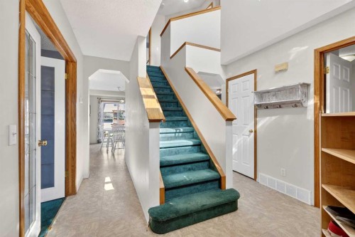 100 Tuscany Way Nw, Calgary, AB - Indoor Photo Showing Other Room