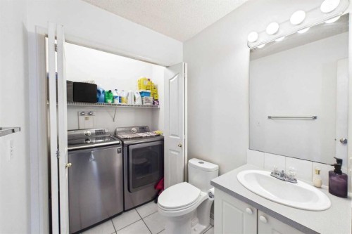 24 Chaparral Ridge Circle Se, Calgary, AB - Indoor Photo Showing Laundry Room