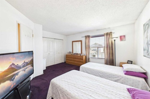 24 Chaparral Ridge Circle Se, Calgary, AB - Indoor Photo Showing Bedroom