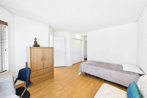24 Chaparral Ridge Circle Se, Calgary, AB - Indoor Photo Showing Bedroom