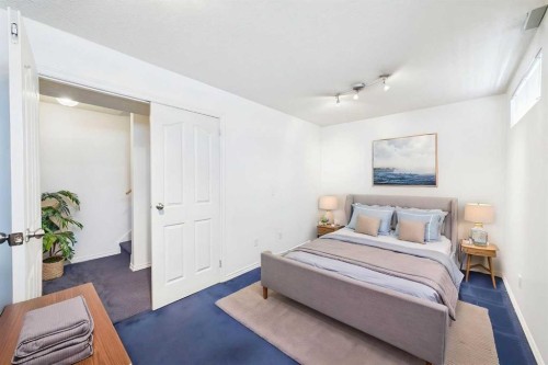 24 Chaparral Ridge Circle Se, Calgary, AB - Indoor Photo Showing Bedroom