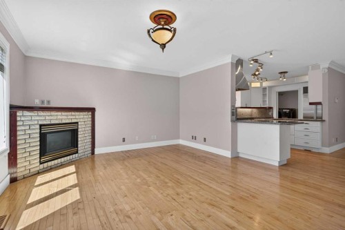 2011 6 Avenue Nw, Calgary, AB - Indoor With Fireplace