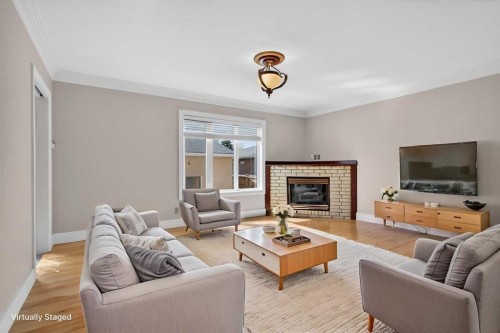 2011 6 Avenue Nw, Calgary, AB - Indoor Photo Showing Living Room With Fireplace