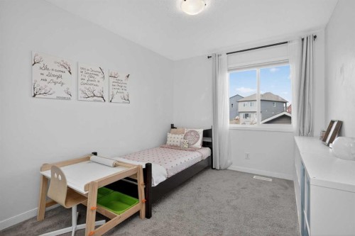 257 Cranford Park Se, Calgary, AB - Indoor Photo Showing Bedroom
