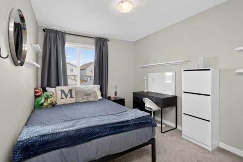 257 Cranford Park Se, Calgary, AB - Indoor Photo Showing Bedroom