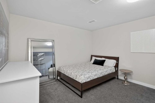 257 Cranford Park Se, Calgary, AB - Indoor Photo Showing Bedroom