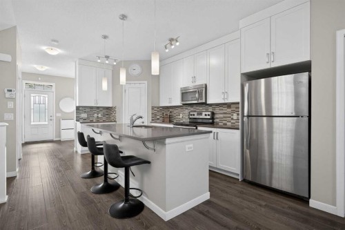 257 Cranford Park Se, Calgary, AB - Indoor Photo Showing Kitchen With Upgraded Kitchen