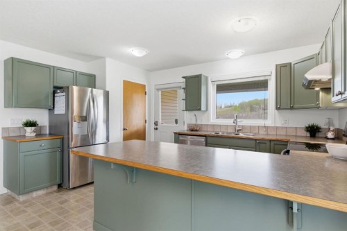 46 Valarosa Drive, Didsbury, AB - Indoor Photo Showing Kitchen With Stainless Steel Kitchen With Double Sink