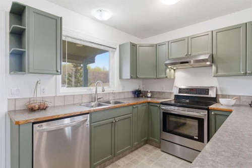 46 Valarosa Drive, Didsbury, AB - Indoor Photo Showing Kitchen With Stainless Steel Kitchen With Double Sink