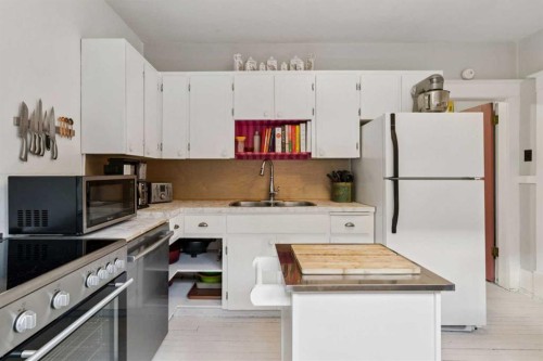 1305 20 Avenue Nw, Calgary, AB - Indoor Photo Showing Kitchen With Double Sink