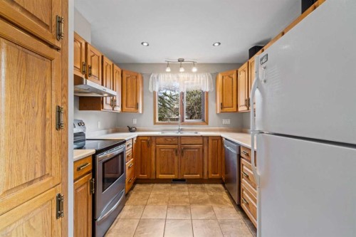 28 Ranchridge Way Nw, Calgary, AB - Indoor Photo Showing Kitchen With Double Sink