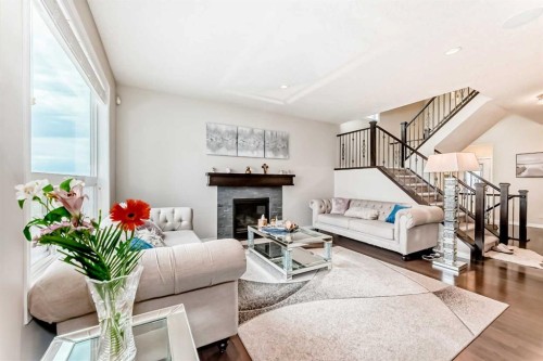 91 Nolanfield Crescent Nw, Calgary, AB - Indoor Photo Showing Living Room With Fireplace