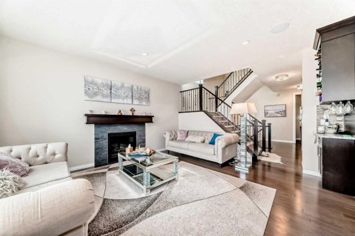 91 Nolanfield Crescent Nw, Calgary, AB - Indoor Photo Showing Living Room With Fireplace