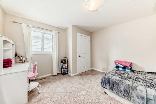 91 Nolanfield Crescent Nw, Calgary, AB - Indoor Photo Showing Bedroom