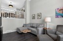 241 Auburn Meadows Drive Se, Calgary, AB  - Indoor Photo Showing Living Room 