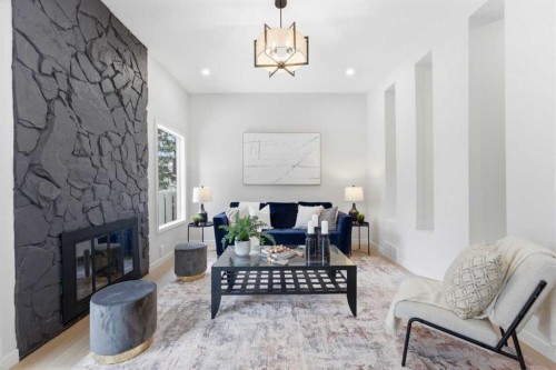 28-99 Midpark Gardens Se, Calgary, AB - Indoor Photo Showing Living Room With Fireplace