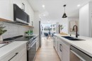 28-99 Midpark Gardens Se, Calgary, AB  - Indoor Photo Showing Kitchen With Double Sink With Upgraded Kitchen 