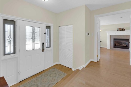 7316 Kananaskis Drive Sw, Calgary, AB - Indoor Photo Showing Other Room With Fireplace