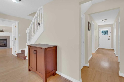 7316 Kananaskis Drive Sw, Calgary, AB - Indoor Photo Showing Other Room With Fireplace