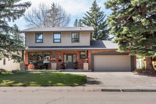 7316 Kananaskis Drive Sw, Calgary, AB - Outdoor With Deck Patio Veranda With Facade
