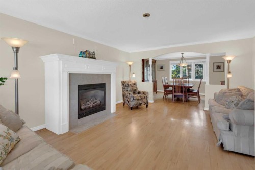 7316 Kananaskis Drive Sw, Calgary, AB - Indoor Photo Showing Living Room With Fireplace