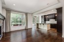 30 Meadow Pointe Drive, Heritage Pointe, AB  - Indoor Photo Showing Kitchen With Fireplace 