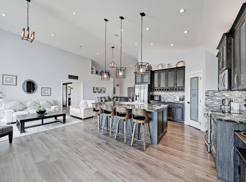 137 Westview Drive, Nanton, AB - Indoor Photo Showing Kitchen With Upgraded Kitchen