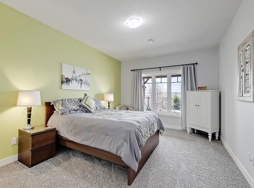 137 Westview Drive, Nanton, AB - Indoor Photo Showing Bedroom