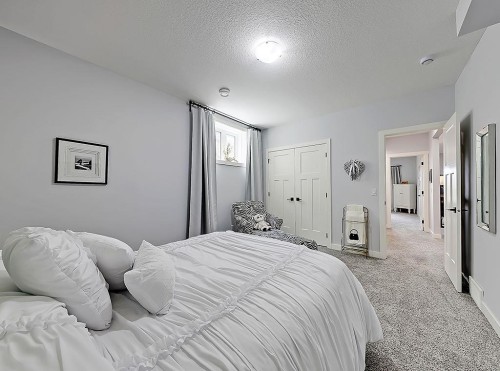 137 Westview Drive, Nanton, AB - Indoor Photo Showing Bedroom