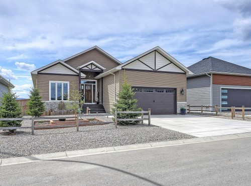 137 Westview Drive, Nanton, AB - Outdoor With Facade