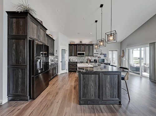 137 Westview Drive, Nanton, AB - Indoor Photo Showing Kitchen With Upgraded Kitchen